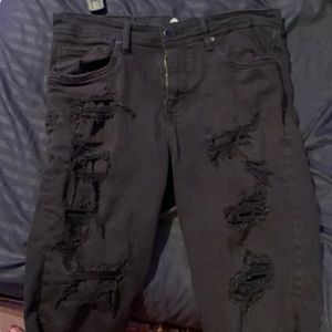 All black ripped jean shorts.